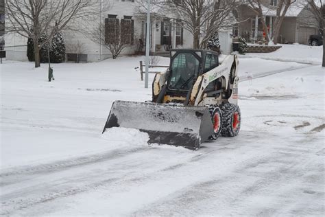 bobcat skid steer snow blade|best bobcat for snow removal.